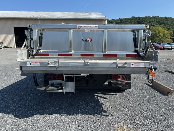 Winter-ready township truck with Galion 133U stainless dump body, Western 9-foot Pro Plus plow and Buyers tailgate spreader, headed to Allegheny County